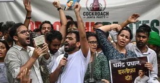 দিল্লিতে ‘ককরোচ পার্টি’র সমাবেশ; শিক্ষামন্ত্রীর পদত্যাগের দাবি